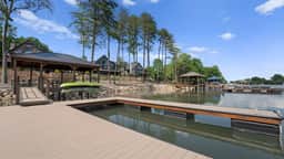 Luxe Lakefront Retreat w/ Pool, Hot Tub, Theater & Private Dock | Sleeps 20+
