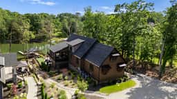 Luxe Lakefront Retreat w/ Pool, Hot Tub, Theater & Private Dock | Sleeps 20+