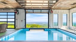Skyline Sanctuary by AvantStay | Indoor Pool, Game Room, Firepit, Mountain Views, Luxe Design