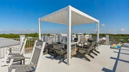 Gulf-View Retreat w/ Rooftop Deck + Private Pool + Golf Cart | Villa Anesi by AvantStay