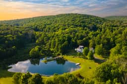 Secluded Estate • Optional Guest House, Pond, Playroom, Gym & Theater | Sunny Pond by AvantStay