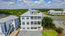 Spacious Coastal Retreat Near Inlet Beach with Bikes, Balconies & Modern Design | Bluewater View by Avantstay
