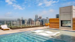 Sleeps 34! 11 Condos in New Austin High Rise w/ Rooftop Pool, Gym, Yoga Studio
