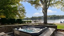 Lake Norman Lakefront w/ Private Beach, Dock, Hot Tub & Fire Pit | Sandy Shore by AvantStay