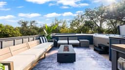 Modern Oasis w/ Pool, Hot Tub, Rooftop Deck & Home Theater | Mariposa Retreat by AvantStay