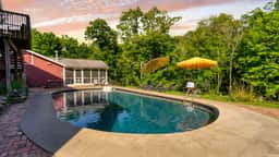 Historic Barn Retreat w/ Pool & Pond Views | Longview Pond Lodge by AvantStay