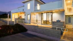 Oceanfront 2BR + Rooftop Deck, & Beach Access | Strand Way B