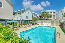 6 10th Avenue by AvantStay | 7BR Coastal Retreat • Walk to Front Beach + Shared Pool + BBQ Grill