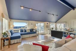 Beachside Retreat w/ Hot Tub, Balcony Dining & Blue-Ceiling Charm | Sea Cured by AvantStay