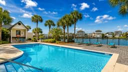 Spyglass by AvantStay | 5BR + 3 Balconies + Community Pool | Walk to Beach + Minutes to HarborWalk Village & Henderson Beach State Park