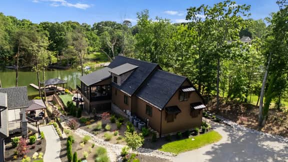 Luxe Lakefront Retreat w/ Pool, Hot Tub, Theater & Private Dock | Sleeps 20+