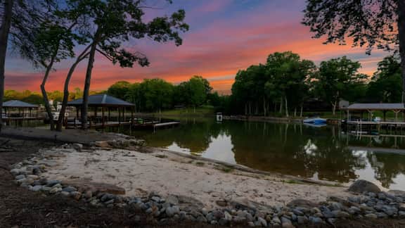 Luxe Lakefront Retreat w/ Pool, Hot Tub, Theater & Private Dock | Sleeps 20+