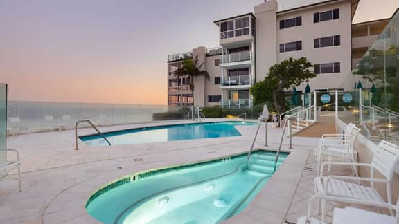 Oceanfront Gem w/ Balcony, Pool, Hot Tub & Carbon Beach Access | Bluewater Haven by AvantStay