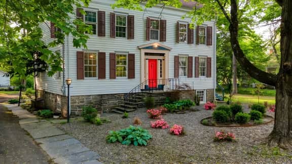 Relax in Style at Historic Modern on Main with Modern Amenities & Wooded Views