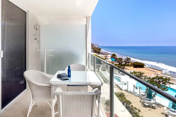 Oceanfront Gem w/ Balcony, Pool, Hot Tub & Carbon Beach Access | Bluewater Haven by AvantStay