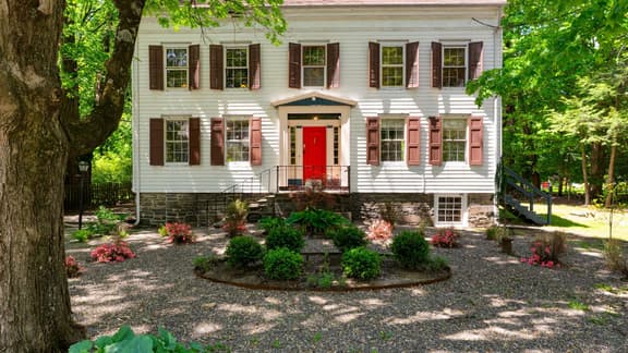 Relax in Style at Historic Modern on Main with Modern Amenities & Wooded Views