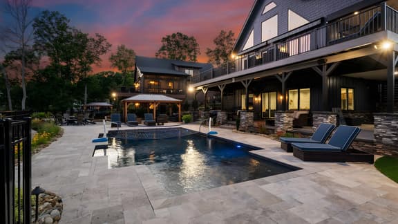 Luxe Lakefront Lodge w/ Pool, Hot Tub, Theater & Private Dock | Sleeps 21