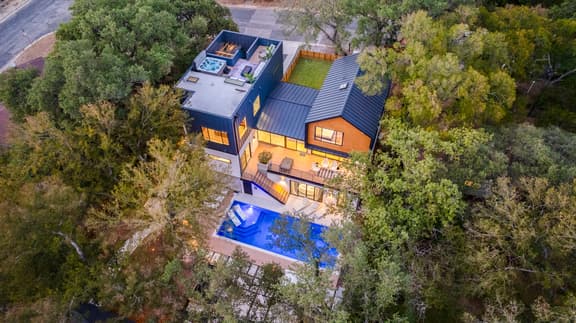 Modern Oasis w/ Pool, Hot Tub, Rooftop Deck & Home Theater | Mariposa Retreat by AvantStay