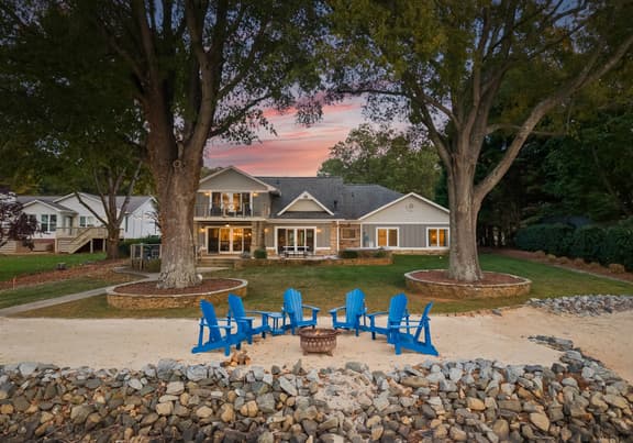 Lake Norman Lakefront w/ Private Beach, Dock, Hot Tub & Fire Pit | Sandy Shore by AvantStay
