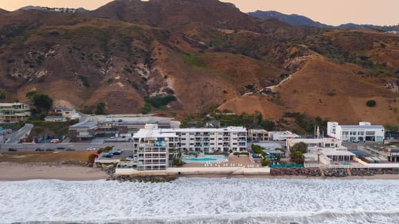 Oceanfront Gem w/ Balcony, Pool, Hot Tub & Carbon Beach Access | Bluewater Haven by AvantStay